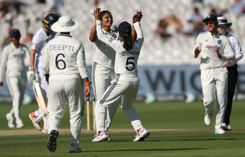 Getty Images India bowler Sayali Satghare celebrates the wicket of England batter Alice Capsey during day three of the 1st Women's Rothesay Test Match between England and India at Lord's Cricket Ground on July 12, 2026 in London, England.