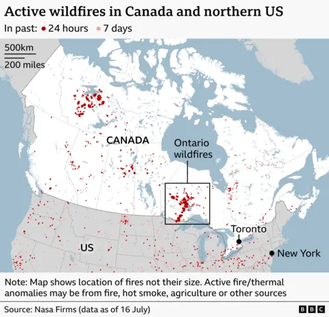 Map of active wildfires across Canada and the northern US. Red dots mark fires detected in the past 24 hours and pink dots show detections from the past seven days. The largest concentration is in northwestern Ontario, highlighted in an inset box, with additional clusters across western and central Canada. Toronto and New York are labelled for reference.