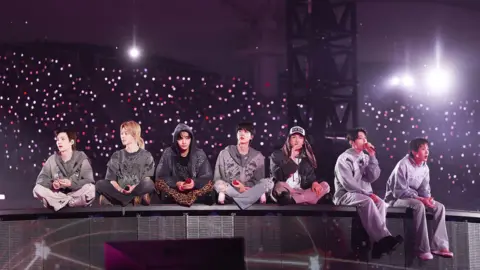 Big Hit / BTS BTS members addressing the audience at Goyang stadium in early April 
