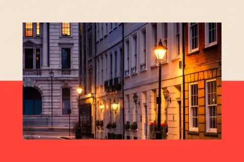 Getty Images St James's Place, London -  street gas lights are illuminted in the early morning light