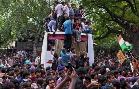 Getty Images Protesters gather as they take part in a demonstration organised by the Cockroach Janta Party (CJP) at Jantar Mantar during the opening day of Parliament's Monsoon Session on July 20, 2026 in New Delhi, 