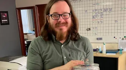 Supplied Image dating from 2022 showing Joshua Kerry, a suspect in the murder of Ann Widdecombe 