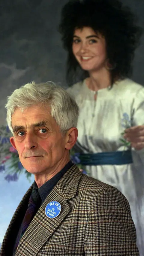 Getty Images Spokesman for the bereaved families of Pan Am flight 103 bombing over Lockerbie Dr. Jim Swire appears in front of a portrait of his daughter Flora, a victim of the bombing, April 25, 2000 in Scotland. 