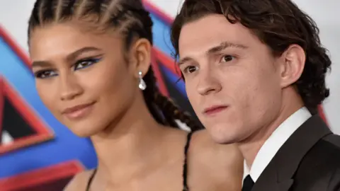 Getty Images A close-up of Zendaya and Tom Holland on the red carpet for Spider-Man: No Way Home in 2021