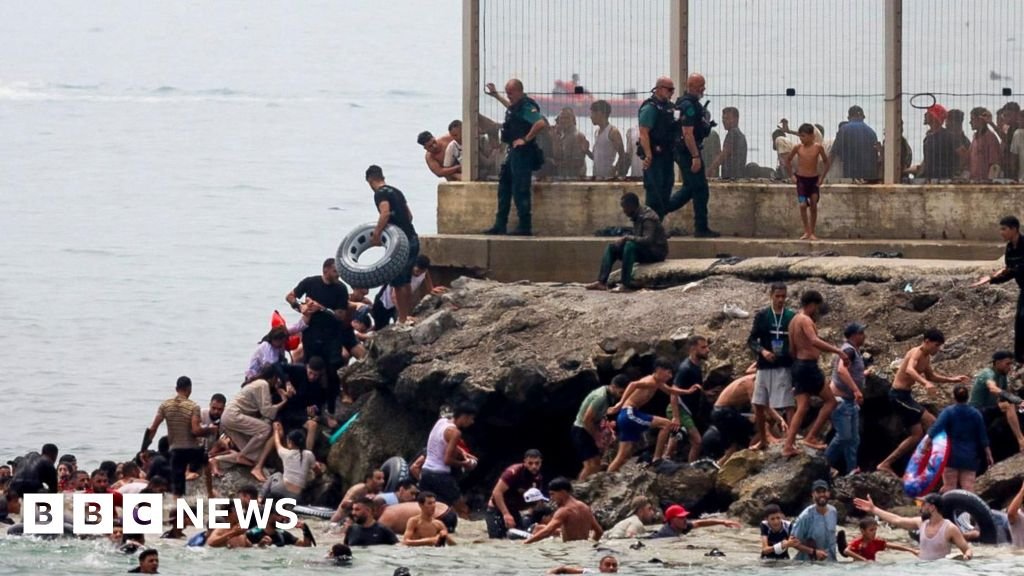 Hundreds of migrants swim from Morocco to Spanish enclave of CeutaThe territory's leader said the influx is overwhelming resources and urged the Spanish government to intervene.2 hrs agoWorld Hundreds of migrants swim from Morocco to Spanish enclave of CeutaThe territory's leader said the influx is overwhelming resources and urged the Spanish government to intervene.2 hrs agoWorld