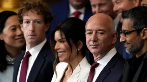 Reuters Meta CEO Mark Zuckerberg stands in a crowd next to amazon Chairman Jeff Bezos and Google CEO Sundar Pichai.
