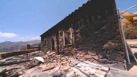 A charred house