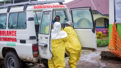 Reuters Congolese health workers receive a patient at the Rwampara General Hospital 