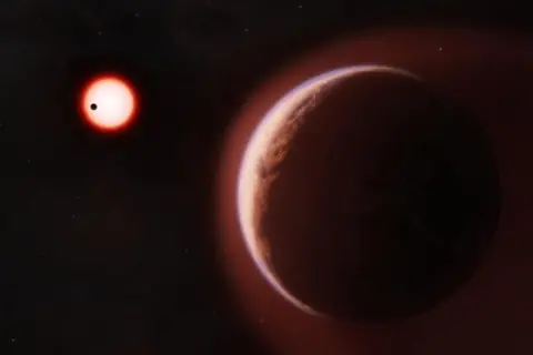 Melissa Weiss/Center for Astrophysics |Harvard & Smithsonian An artist's impression of exoplanet LHS 1140b, a large reddish-brown rocky planet filling the foreground, edged with a faint blue-white atmospheric glow. In the dark background, a small red star glows brightly, with a second, closer planet shown as a tiny black silhouette crossing in front of it