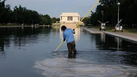 Getty Images Workers clean the Lincoln Memorial Reflecting Pool on the National Mall on June 25, 2026 in Washington, DC.