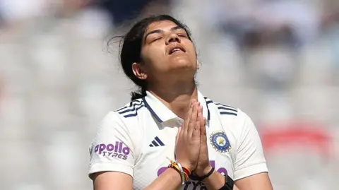 Getty Images India batter Yastika Bhatia celebrates her century during day three of the 1st Women's Rothesay Test Match between England and India at Lord's Cricket Ground on July 12, 2026 in London, England.