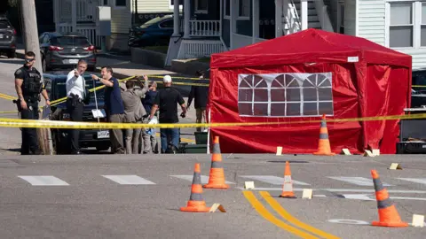Getty Images FBI agents investigate the scene in Biddeford, Maine where a man reportedly died after an encounter with immigration officials