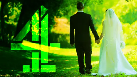 BBC A groom dressed in a dark suit and a bride dressed in white walk hand in hand along a sunlit grassy path, surrounded by tall green trees. Bright sunlight filters through the leaves. A large green Channel 4 logo sits to the left.