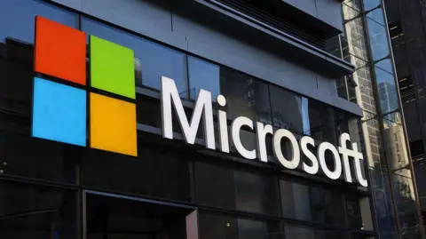Getty Images A Microsoft building with a sign bearing the company's logo
