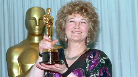Getty Images Brenda Fricker with her Oscar in 1990
