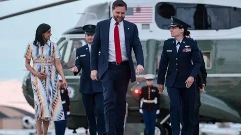 AFP via Getty Images JD Vance and his wife, Usha Vance, at Joint Base Andrews, Maryland