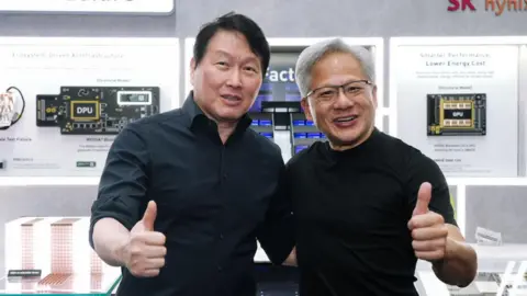 SK Hynix SK Hynix chairman Chey Tae-won and Nvidia boss Jensen Huang posing for a picture with their thumbs up 