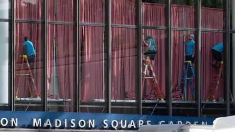 Getty Images Blush-pink coloured curtains being hung at Madison Square Garden