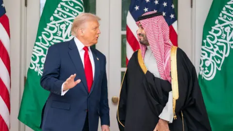 EPA Trump leads Saudi Crown Prince Mohammed bin Salman on a tour of the White House in Washington DC last November