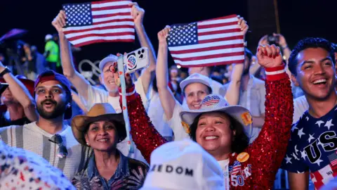 Reuters People gather ahead of a Fourth of July rally featuring U.S. President Donald Trump to mark the 250th anniversary of U.S. independence, in Washington, D.C., U.S., July 4, 2026.
