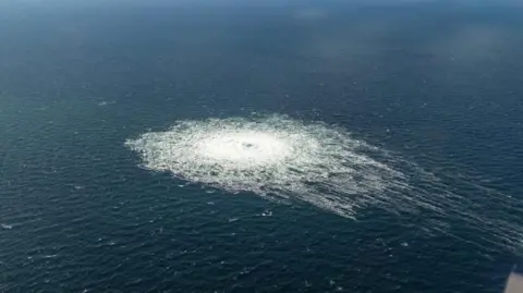 Danish Defence Command A gas leak in seen in blue waters