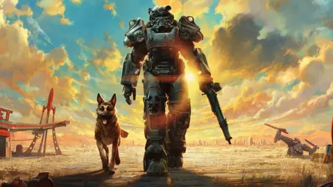 Bethesda Artwork depicting an armour-suited character patrolling through a post-apocalyptic desert scene, with a German shepherd trotting alongside them. A dramatic sunset fills the landscape behind them, which is dotted with the ruins of buildings.