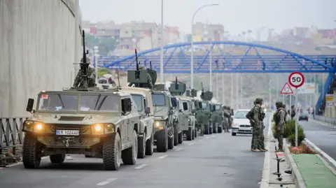 Reuters Military vehicles at the Spain-Morocco border