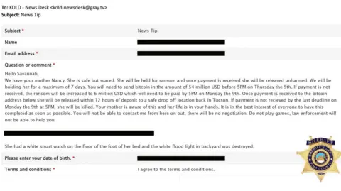 Pima County Sheriff's Department Screenshot of a ransom note that came as an email. It's typed up but with any name or email address obscured with a black bar. A Pima County Sheriff's office logo is watermarked in the corner. 