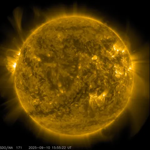 NASA An image of the Sun - with the star appearing bright yellow against a black background - that was captured by NASA, the US Space Agency. The picture gives a vivid sense of how much energy is emitted from the Sun - the surface visibly glows and there are ejections of hot, glowing gas into space.    