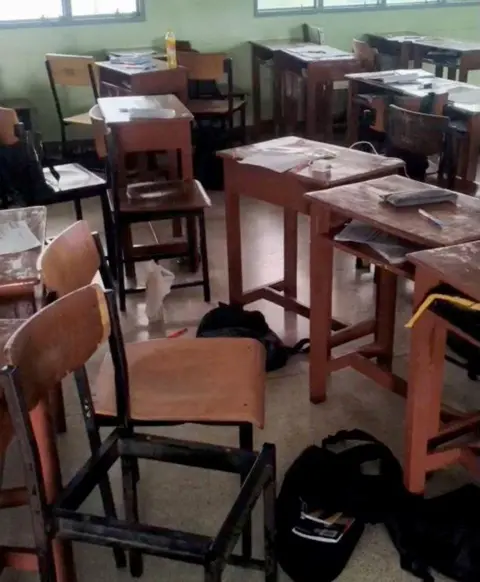 Reuters Students' belongings and furniture scattered in a classroom, following a shooting incident at Debsirin Nonthaburi School