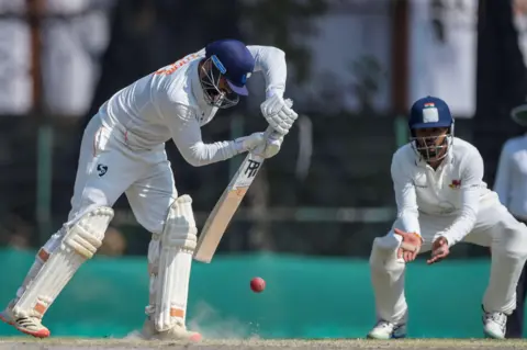 Abid Bhat Auqib Nabi batting
