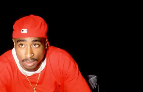 Getty Images Tupac poses for photograph at the Source Awards in New York