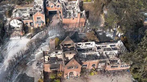 Getty Images An aerial view of the remains of a home on Brunswick Gate following a huge fire in Stourbridge. The house roofs are burnt out.