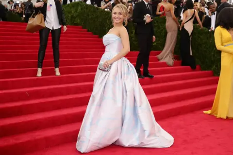 Getty Images Hayden Panettiere wearing a long pale pink ball gown attends the "Charles James: Beyond Fashion" Costume Institute Gala at the Metropolitan Museum of Art on May 5, 2014 in New York City