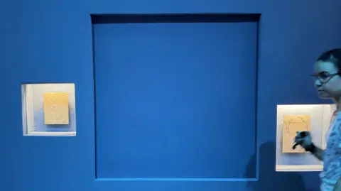 Getty Images An empty blue display in an exhibition at the Vienna Museum of Applied Arts (MAK).