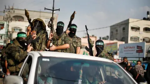 Reuters FILE PHOTO: Hamas militants celebrate what they say is a victory over Israel after an eight-day conflict during a rally in the northern Gaza Strip November 22, 2012