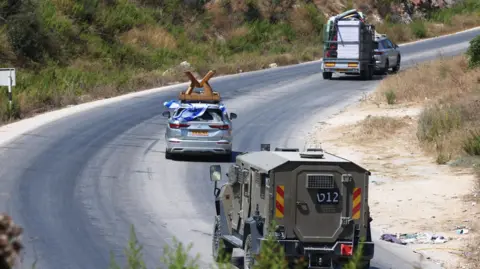 EPA Israeli settlers move into the former Israeli settlement of Kadim near the West Bank city of Jenin, 20 August 2026.