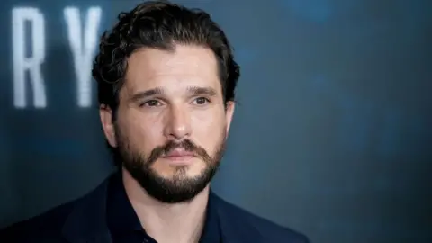 Variety via Getty Images Kit Harrington appears on the red carpet for a premier 