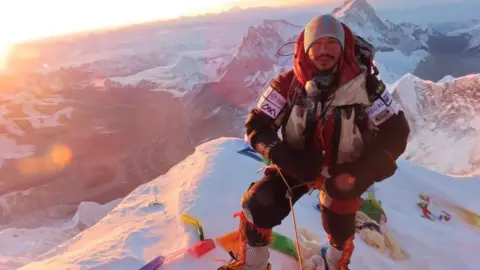 AFP Nirmal Purja at the summit of Mount Everest