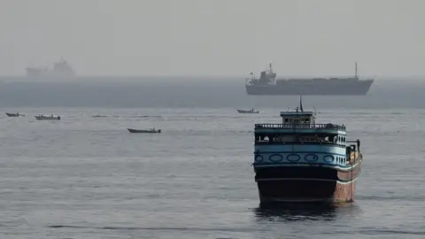 Reuters Vessels in the Strait of Hormuz, as seen from the Musandam Peninsula, Oman (3 August 2026)