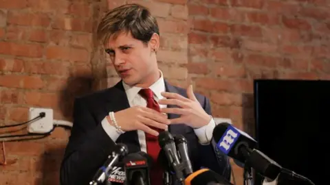 Reuters Yiannopoulos seen holding a news conference in 2017