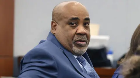 AFP via Getty Images Duane Davis looks on during the fourth day of jury selection in his murder trial, related to the 1996 killing of rapper Tupac Shakur, at Clark County District Court Regional Justice Center in Las Vegas, Nevada, on August 13, 2026. 


