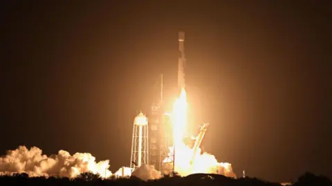 AFP via Getty Images File image of a a Space X Falcon 9 rocket launching from Cape Canaveral, Florida, on 15 January 2025. Flame from the rocket are visible at the base as it hurtles into the air