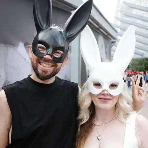 Getty Images Ariana Grande fans in bunny ear costumes 