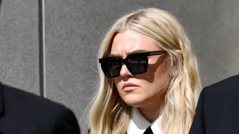 AP Erika Kirk leaves the Fourth District Courthouse, Monday, July 6, 2026, in Provo, Utah, after a hearing for Tyler Robinson, accused in the fatal shooting of Charlie Kirk