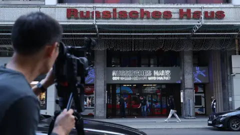 Getty Images A television reporter films Russian House of Science and Culture shortly after German Foreign Minister Johann Wadephul announced Germany's response to the failed drone attack at Leipzig airport September 01, 2026 in Berlin