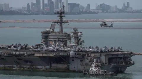 Reuters The U.S. Navy Nimitz-class aircraft carrier USS Abraham Lincoln sails toward Laem Chabang Port before docking for a rest stop following a long deployment in the Middle East.