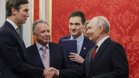 Reuters Russian President Vladimir Putin greets Jared Kushner, U.S. President Donald Trump's son-in-law, and U.S. Special Envoy Steve Witkoff during a meeting at the Kremlin in Moscow, Russia
