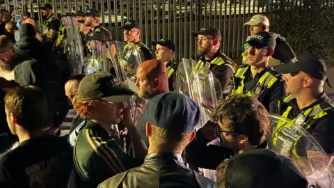 Protesters face off against the police in Portsmouth