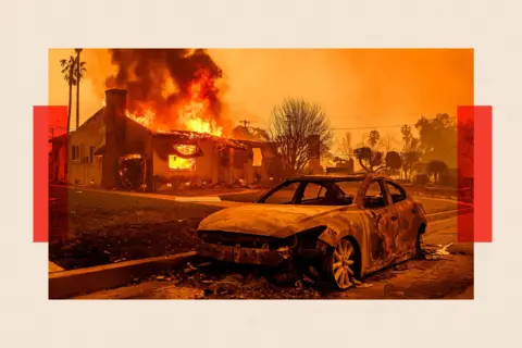 AFP via Getty Images The carcass of a burnt-out car is seen as home burns during the Eaton fire in the Altadena area of Los Angeles county